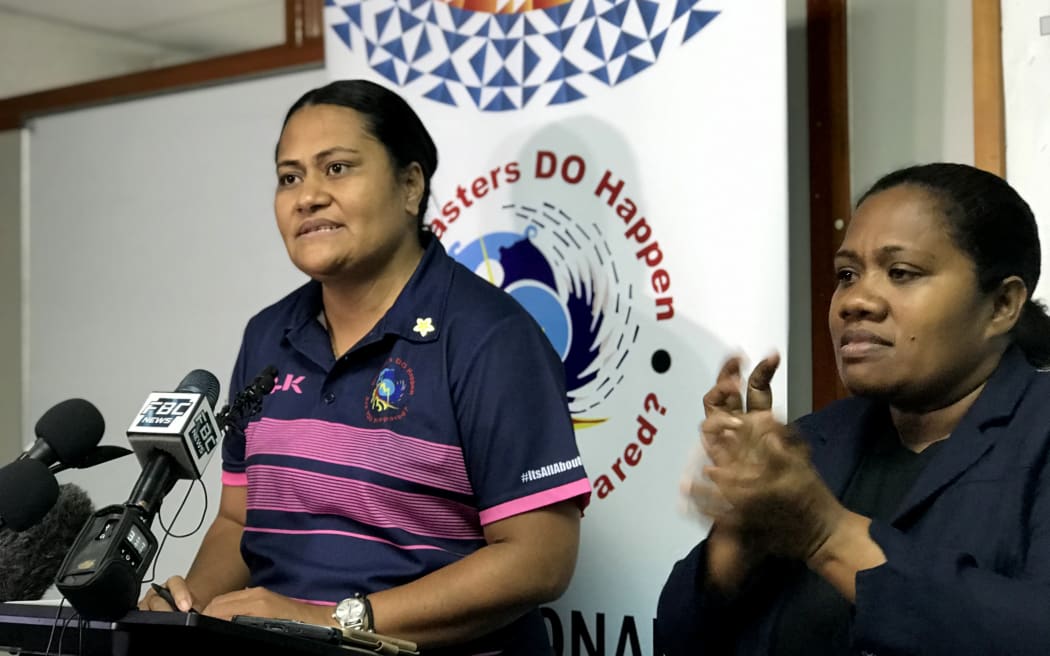Fiji's national disaster management office director Vasiti Soko (left) speaks at a press conference ahead of the arrival of super Cyclone Yasa in Fiji's capital city of Suva on December 16, 2020.