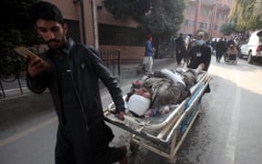Pakistan mosque blast: Police targeted in attack that kills 59