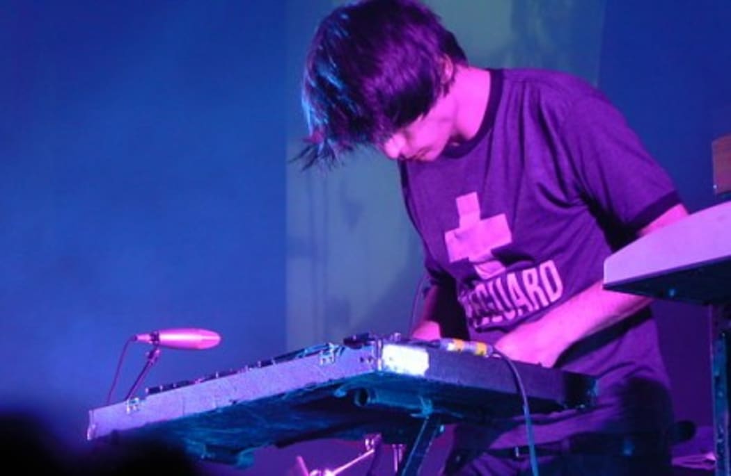 Jonny Greenwood playing a glockenspiel with Radiohead at the Heineken Music Hall
