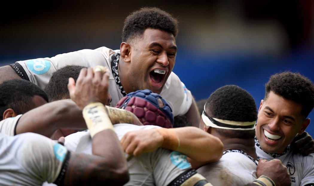 The Flying Fijians are all smiles after another try.