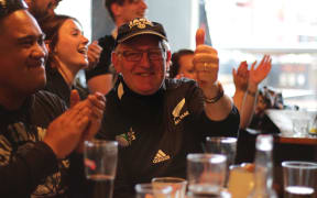 Wellington fans celebrate the win.