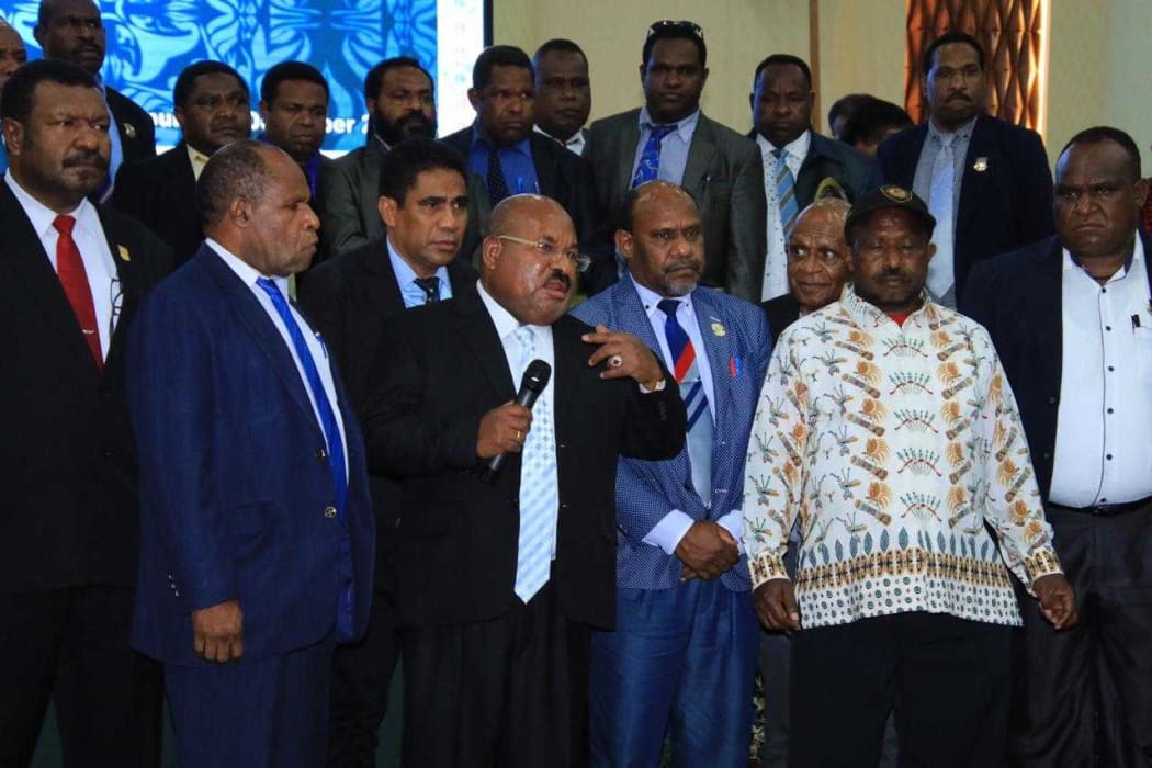 Papua governor, Lukas Enembe, speaks to a plenary meeting of the provincial parliament about armed conflict in the Highlands.