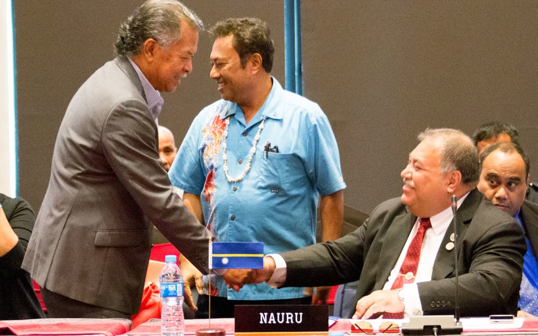 Cooks Islands Henry Puna meets Nauru's Baron Waqa at a meeting of Small Island states before the Pacific Islands Forum 2015