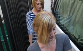 Australian TV presenter Tara Brown (back) and Sally Faulkner, an Australian woman accused of abducting her children from her ex husband, are released from prison on April 20, 2016