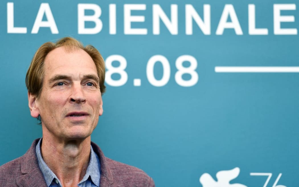 (FILES) In this file photo taken on September 3, 2019, British actor Julian Sands poses during the photocall for the movie "The Painted Bird" of Czech director Vaclav Marhoul, presented in competition during the 76th Venice Film Festival at Venice Lido. - Sands has been missing for a week after he went hiking in a snowy mountain range in California, authorities said on January 19, 2023, adding the search had been hampered by bad weather. Sands, 65, was in the Baldy Bowl area of Mount Baldy, outside Los Angeles in southern California, when he went missing. (Photo by Alberto PIZZOLI / AFP)