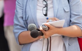 Journalist at media interview