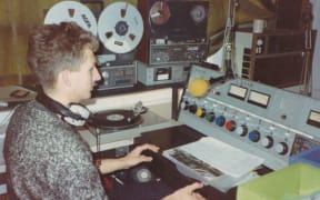 A Radio Active DJ at the controls in 1984.