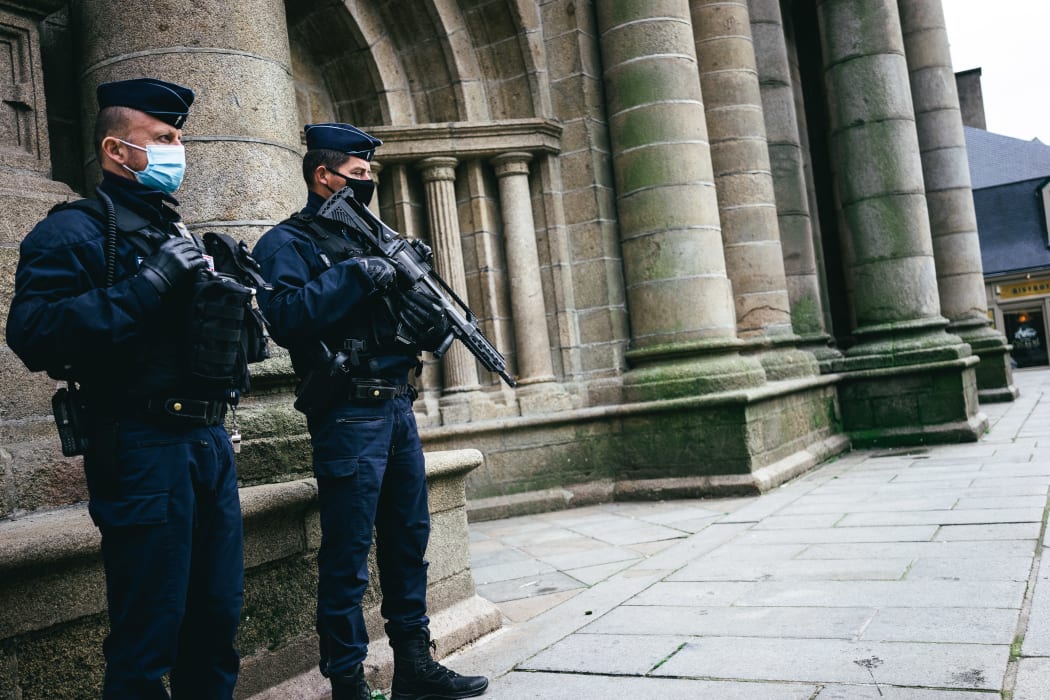 Members of the police force monitor a place of worship after the two attacks in Nice and Avignon and the disconnection of the red level from the vigipirate plan.