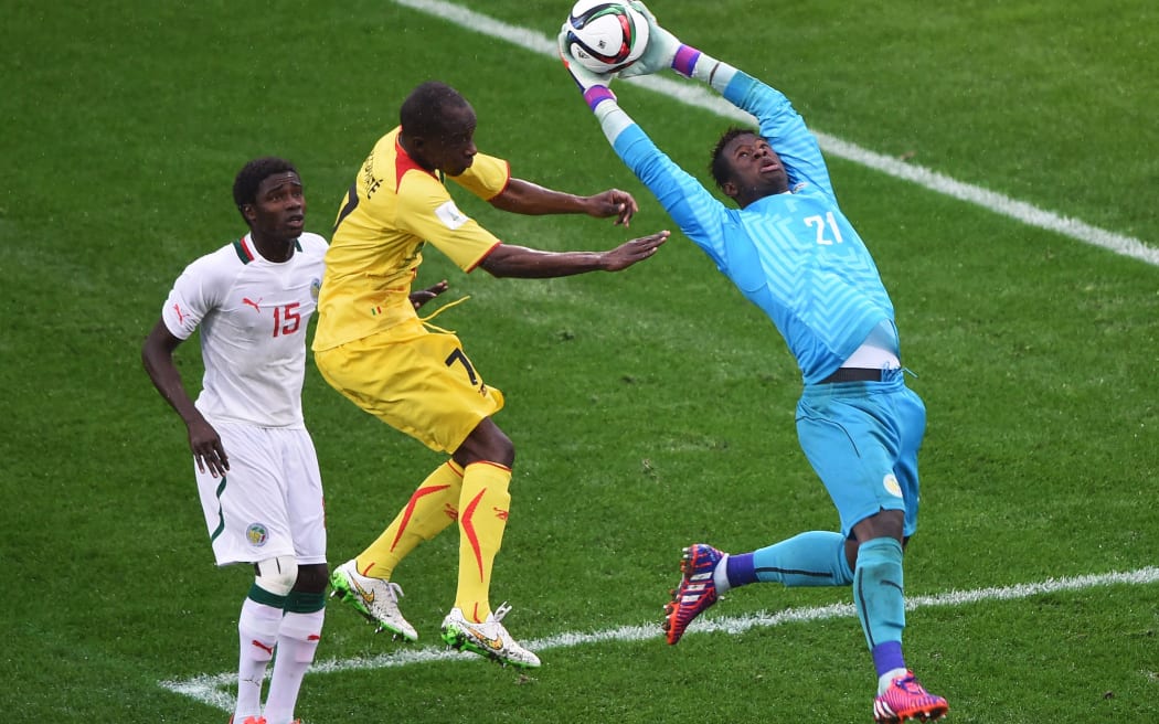 Senegal goal keeper Ibrahima Sy in action