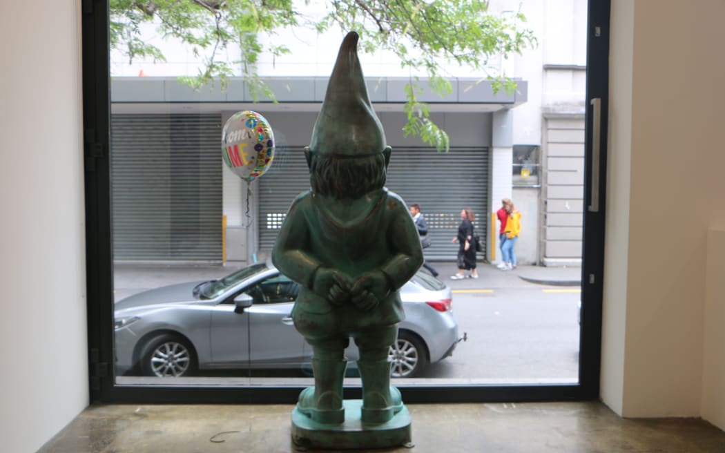 The stolen gnome is back home in the Gow Langsford gallery.