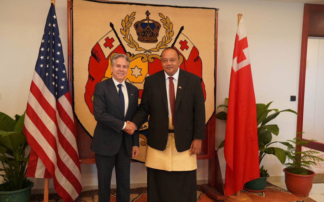 US Secretary of State Antony Blinken shakes hands with Tonga’s Prime Minister Tonga’s Prime Minister Hu’akavemeiliku Siaosi in Nuku'alofa on 26 July, 2023.