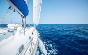 Sail boat on the open sea (stock image).