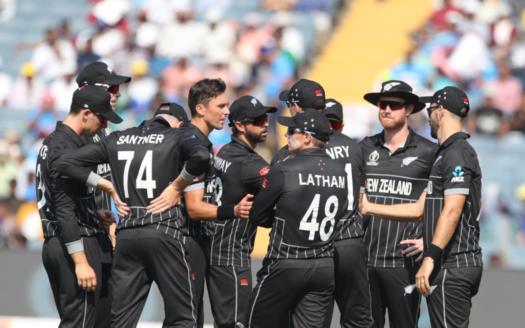 New Zealand's Trent Boult celebrates the wicket of Temba Bavuma (captain) of South Africa during the ICC Men's Cricket World Cup 2023 match between South Africa and New Zealand