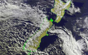 Satellite image shows the cold front moving across New Zealand.