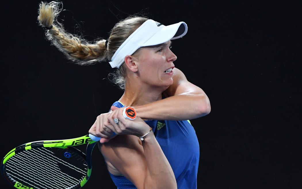 Caroline Wozniacki has ended her long wait for a maiden grand slam.