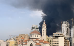 A picture shows smoke from a huge fire raging in Beirut port on September 10, 2020.