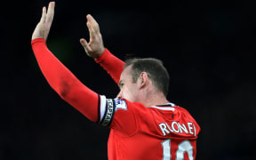 Wayne Rooney of Man Utd celebrates after scoring.