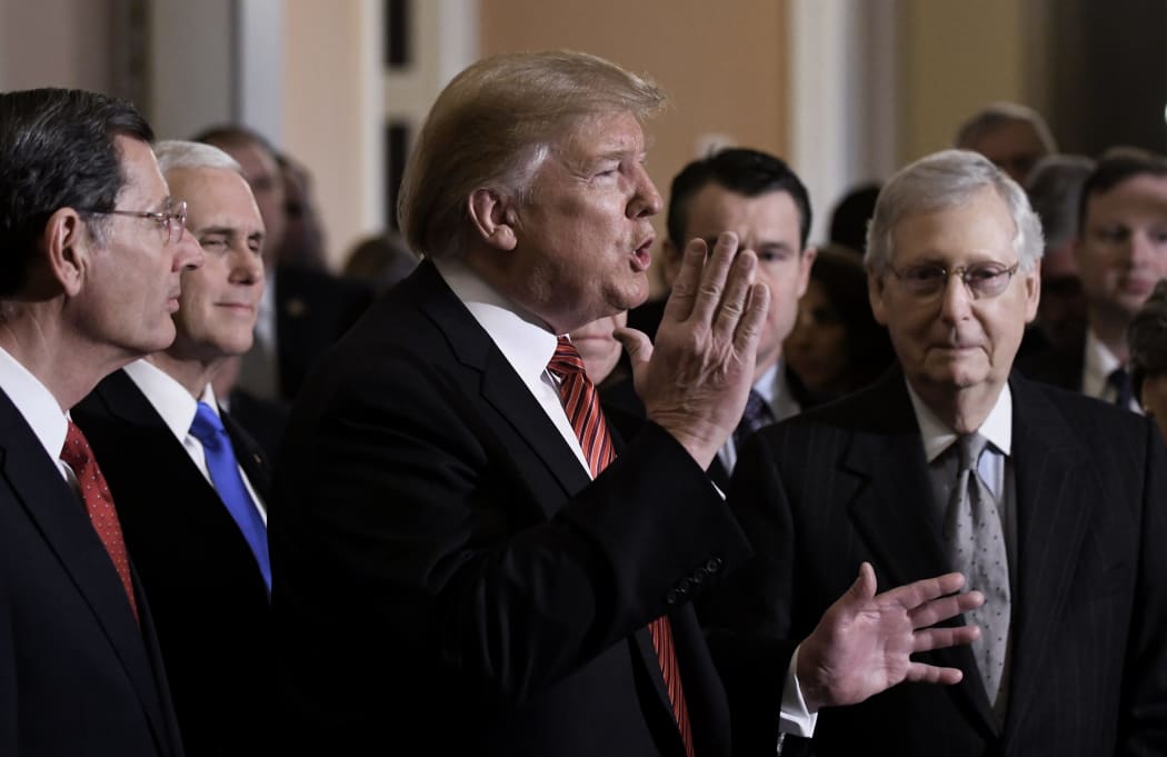 United States President Donald Trump talks to the press after the Republican Policy luncheo on January 9, 2019 in Washington, DC. L-R: Senator John Barrasso, US Vice President Mike Pence, Trump, US Senate Majority Leader Mitch McConnell