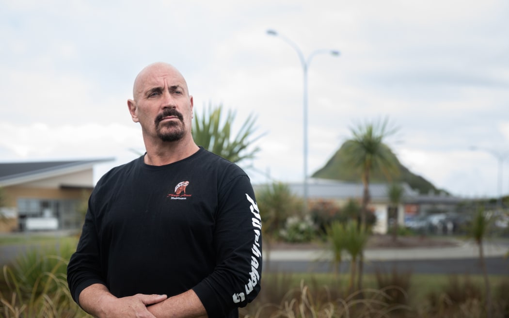 Billy Macfarlane stands outside Kohuora Auckland South Corrections Facility, a SERCO run high security men’s prison located at Wiri, in Auckland.