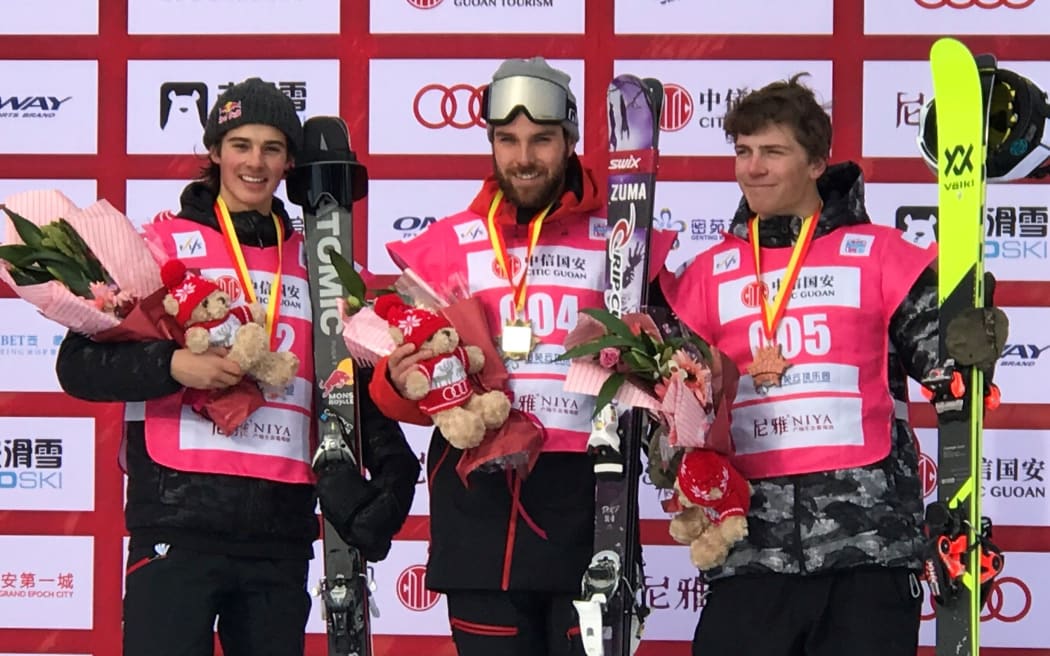 Nico Porteous (left) on the podium for the first time at a World Cup event.
