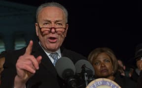 Charles Ellis "Chuck" Schumer, the senior United States Senator from New York and a member of the Democratic Party, speaks at a rally against Donald Trump.