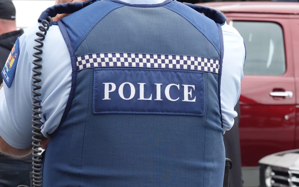 Auckland, New Zealand - October 10, 2019 : Close up of a New Zealand police officer's uniform and badge
