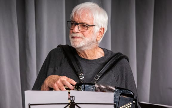 Ross Harris and accordion at his 2022 Lilburn Lecture at The National Library of New Zealand. Ross is a member of The Kugels.