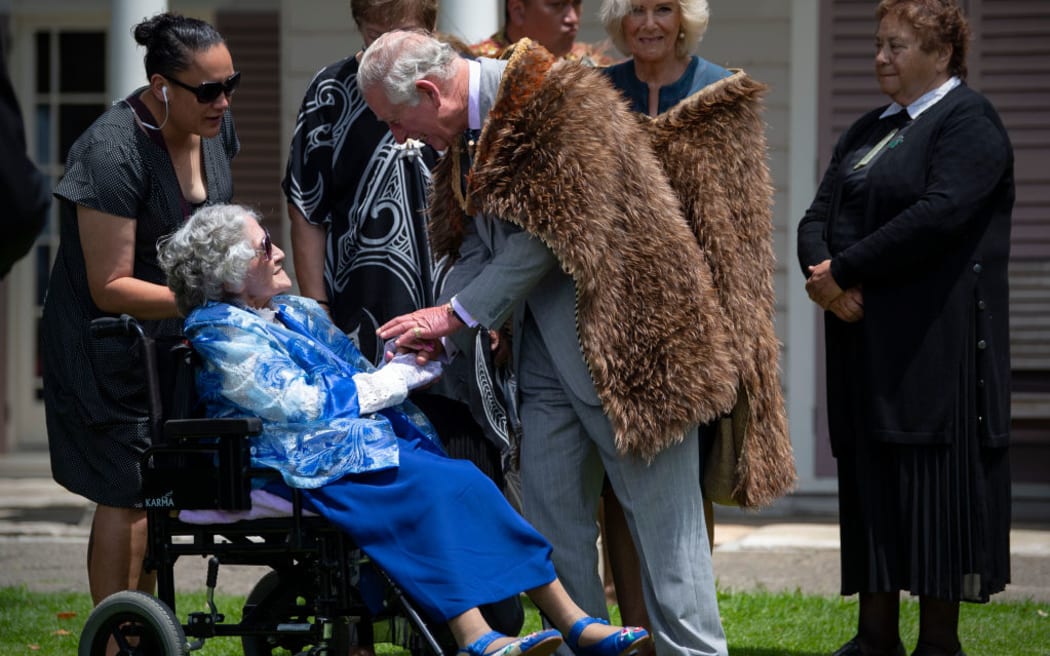 Titewhai Harawira speaking with King Charles at the Waitangi Treaty Grounds