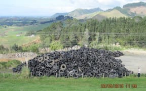 The tyres are being stored on farmland in Taupo and here at a quarry in Waihi Beach.