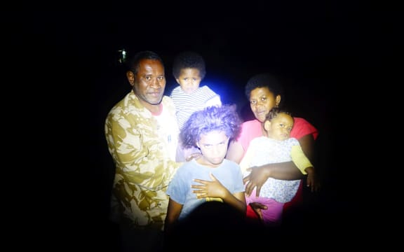 Kameli Karavaki and his family in Nacamaki village on Koro Island, Fiji