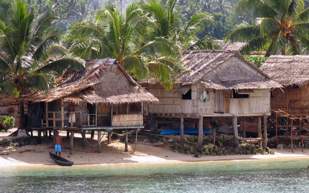 A village on the beach near Auki, the capital of Malaita. Aug 2015 via wiki commons