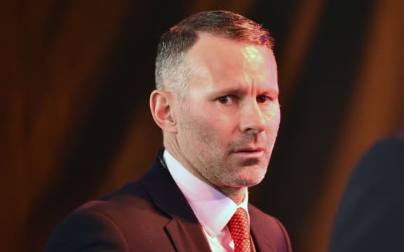 In this file photo taken on November 30, 2019 Wales' coach Ryan Giggs arrives to attend the UEFA Euro 2020 football competition final draw in Bucharest.