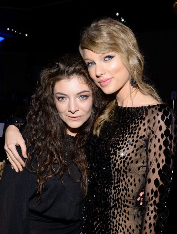 Lorde and Taylor Swift attend the 56th annual Grammy Awards.