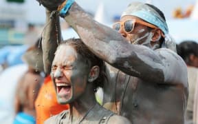 People enjoying themselves at the Boryeong Mud Festival in South Korea, the Rotorua festival's official partner.