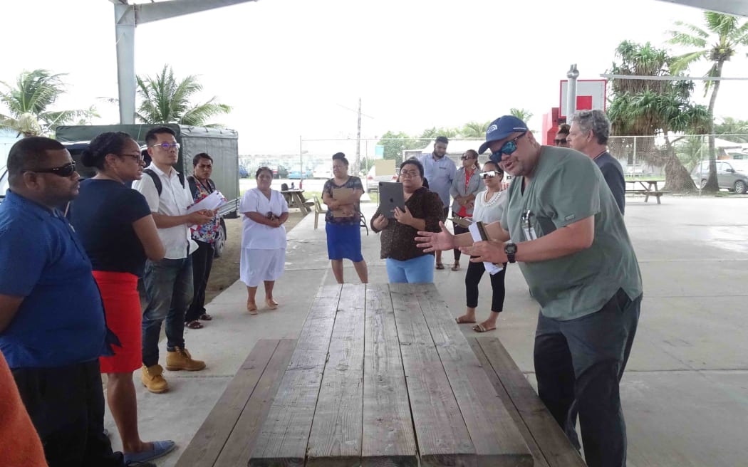 Marshall Islands public health director Dr Frank Underwood (right) leading a recent ministry of health exercise managing patients in gymnasiums, to prepare for the expected arrival of Covid-19.