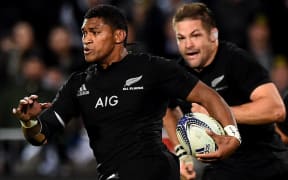Waisake Naholo on the break against Argentina, with Richie McCaw in support.