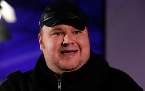 Kim Dotcom pictured in 2014 (speaking to Internet Party followers on September 20, 2014 in Auckland, New Zealand)