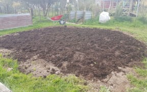The compost pile near a Carterton school that is being blamed for a smell that made several schoolchildren fall ill.