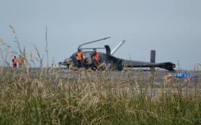 Accident inspectors at the helicopter crash site in Kekerengu.