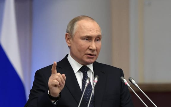 Russian President Vladimir Putin gives a speech at a meeting of advisory council of the Russian parliament in Saint Petersburg.