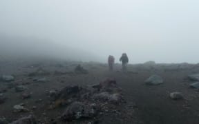 Trampers in the Tongariro mist