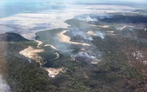 Fire evacuation points on Fraser Island were underwater due to high tides and huge waves, a week after blazes ravaged the island.