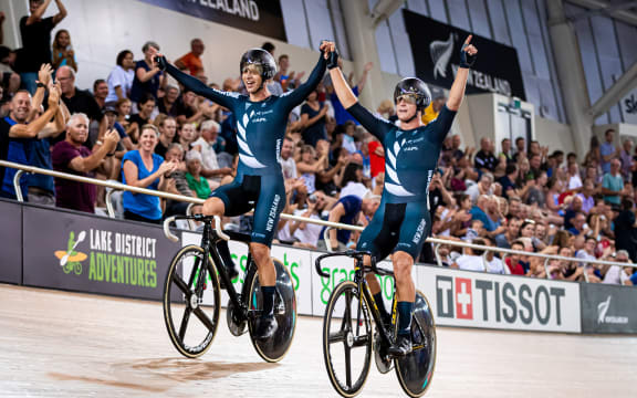Track Cycling World Cup - Cambridge, New Zealand - Campbell Stewart and Aaron Gate of New Zealand celebrate winning Gold in the Men's Madison.