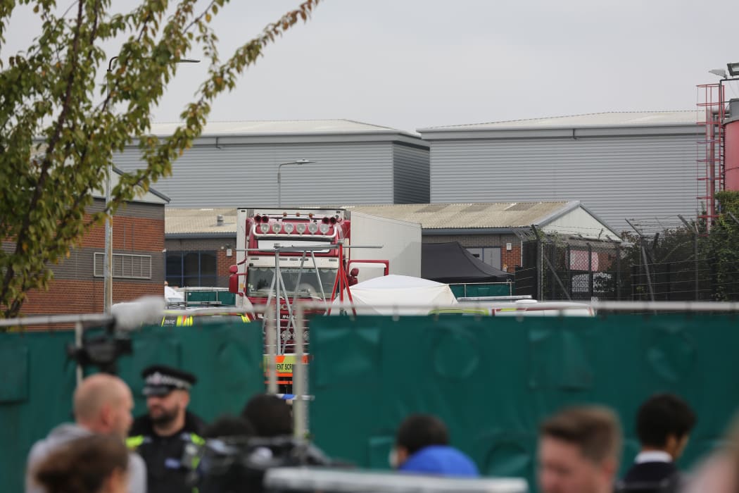 The bodies were discovered in an industrial park, east of London.