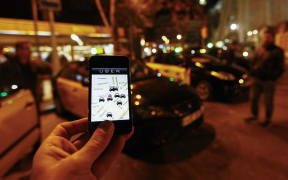 A Madrid judge has banned the popular Uber smartphone taxi service from operating in Spain.