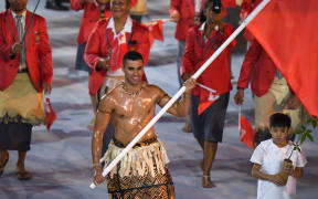 Pita Taufatofua leads Tonga's delegation during the opening ceremony of the Rio 2016 Olympic Games in Rio de Janeiro on 5 August 2016.