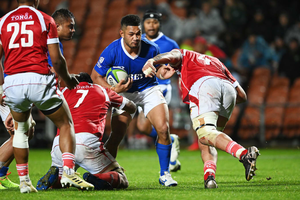 A close up picture of an attempted tackle during the international rugby union test match between Manu Samoa v Tonga in Hamilton July 2021.