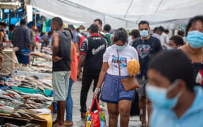 This photo from April shows shoppers in Suva's fish market preparing for a lockdown in late April.