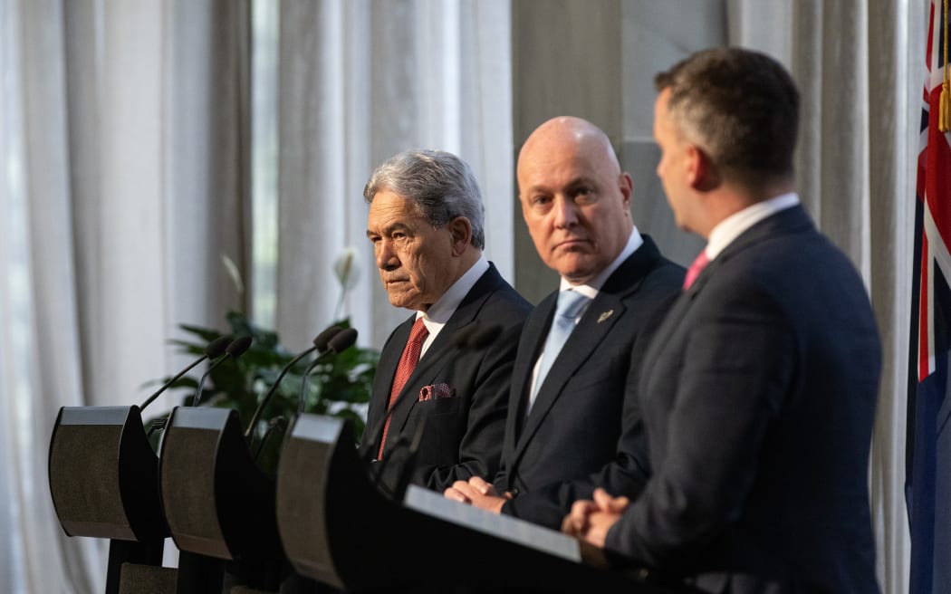 Coalition agreement signing ceremony between Christopher Luxon, David Seymour and Winston Peters.