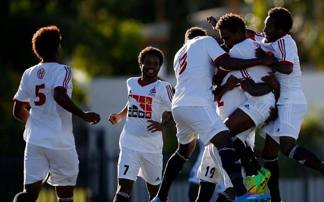 Hekari United players celebrate scoring a goal against Tafea FC.
